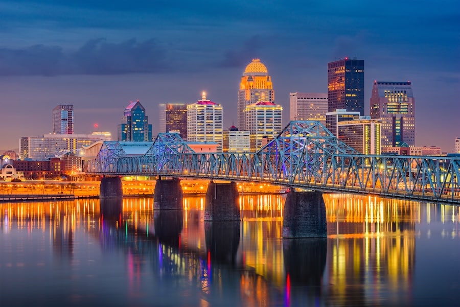 Louisville, Kentucky, USA downtown skyline on the Ohio Riiver at dusk.