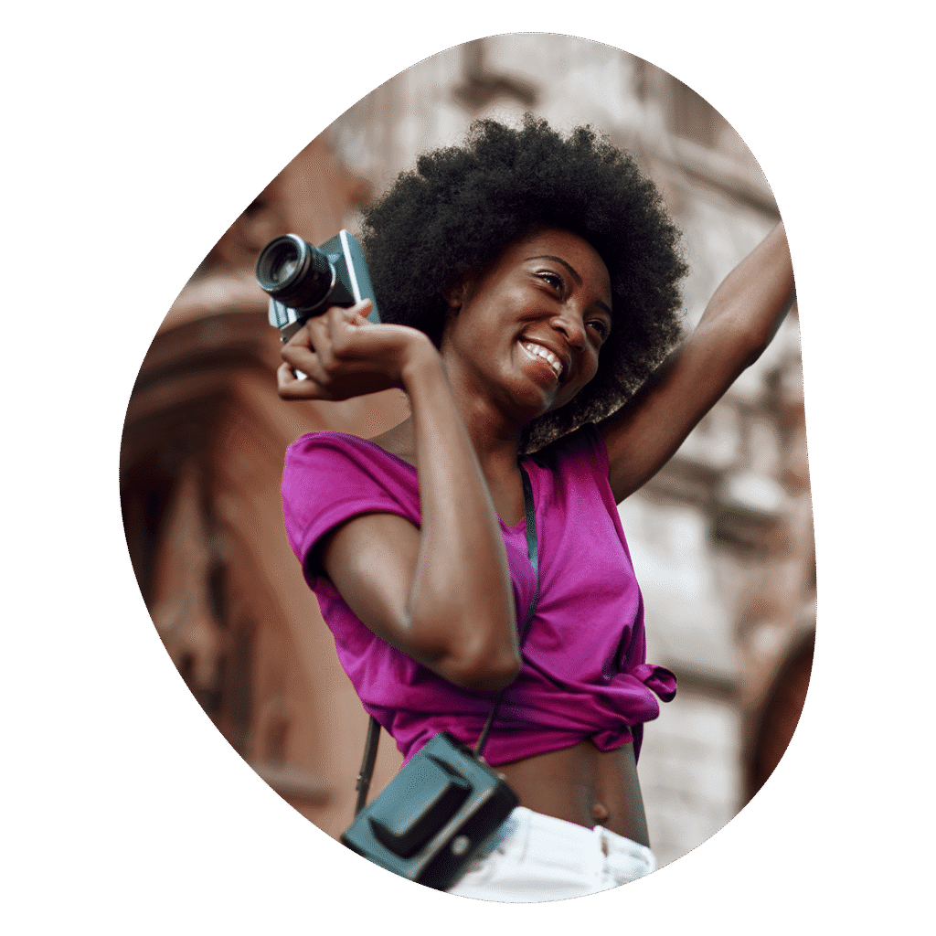 Travel nurse smiling taking photos while traveling